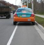 Beck Taxi in the bike lane