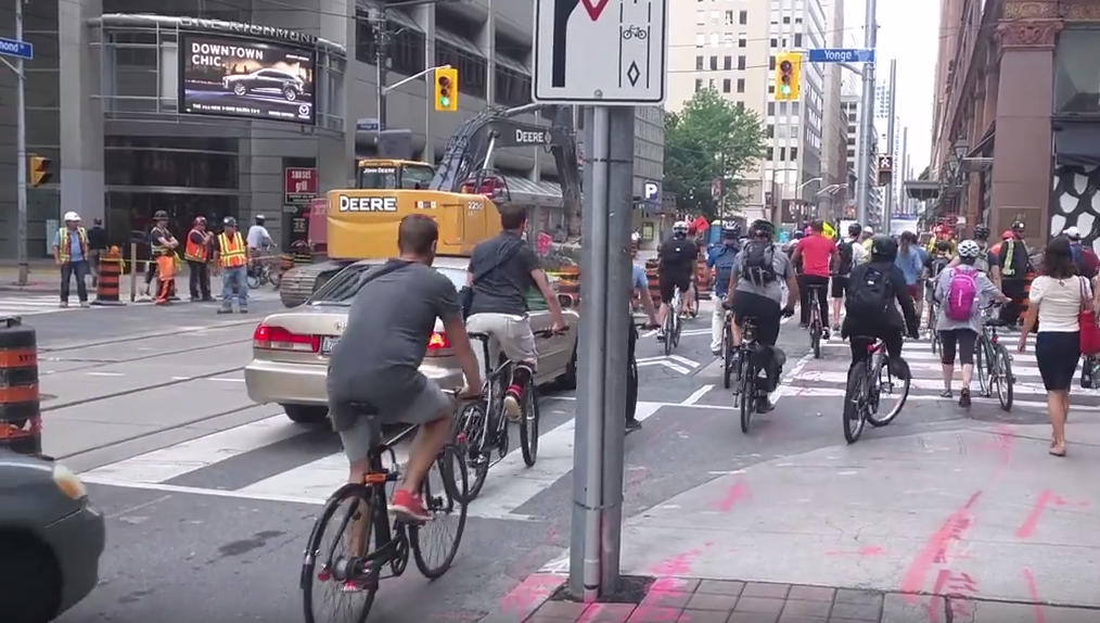 Cyclists struggling for space on Richmond at Yonge.