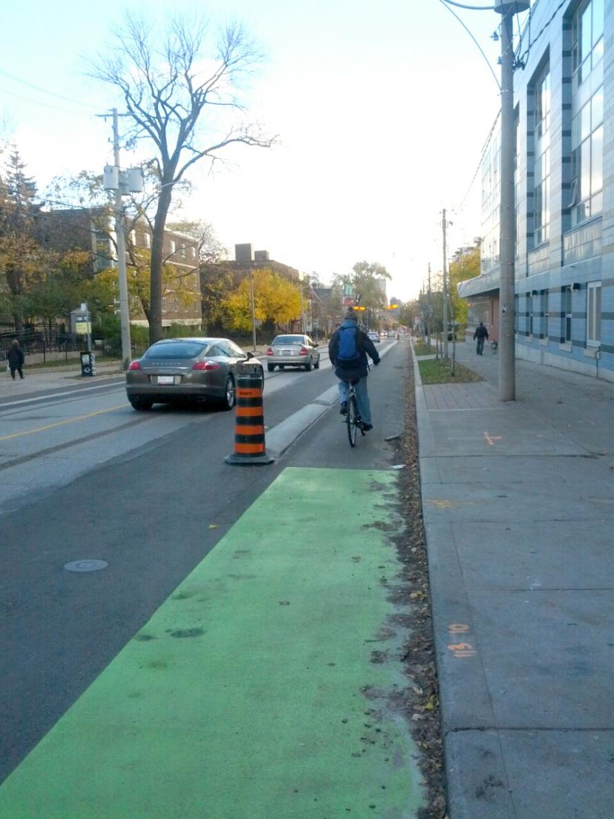 Sherbourne separated bike lane and cyclist Sherbourne separated bike lane and cyclist